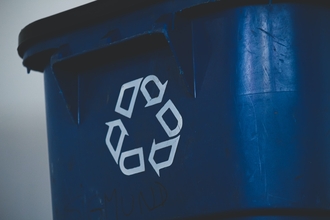 Plastic bin with recycle symbol