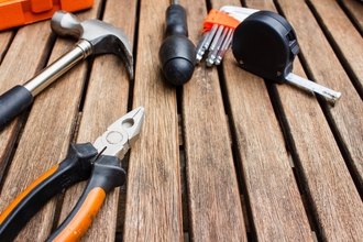 Tools laid out on a wooden table