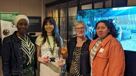 A group of women from various Green Spaces Fund projects enjoying the event